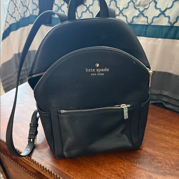 kate spade Handbags - Kate Spade Black Leather Backpack with Silver Zippers